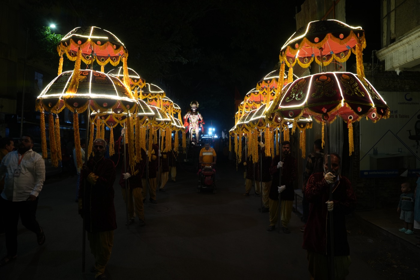 Illuminated decorative umbrellas in Shobha Yatra