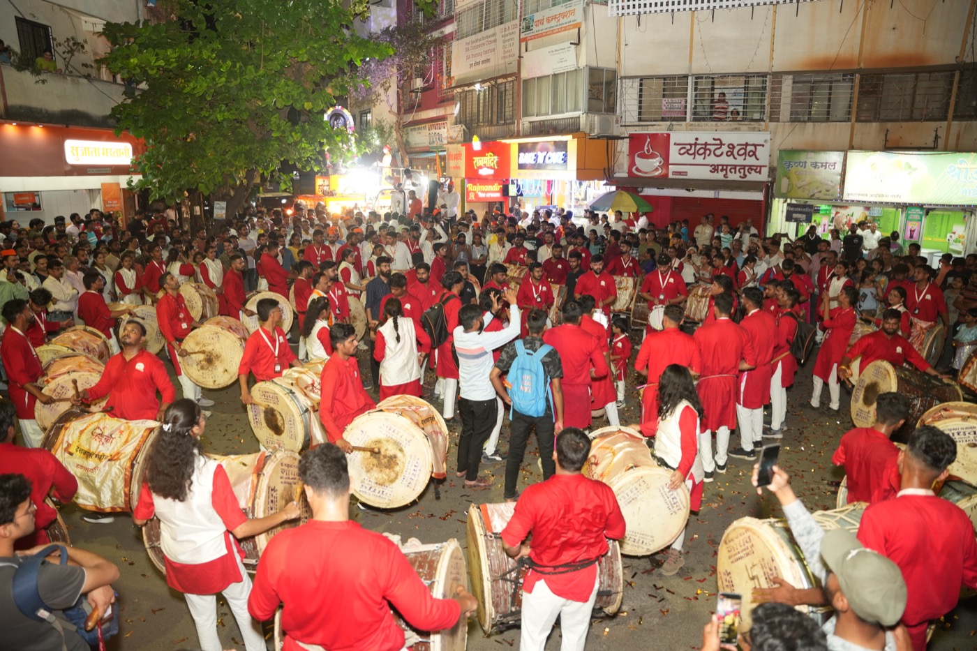 Large Dhol Tasha group performing at Shobha Yatra